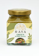 Jar of Raya Green Curry Paste with a gold lid on a white background